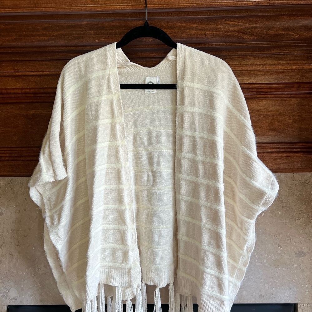 Elegant Cream Cardigan with Fringe